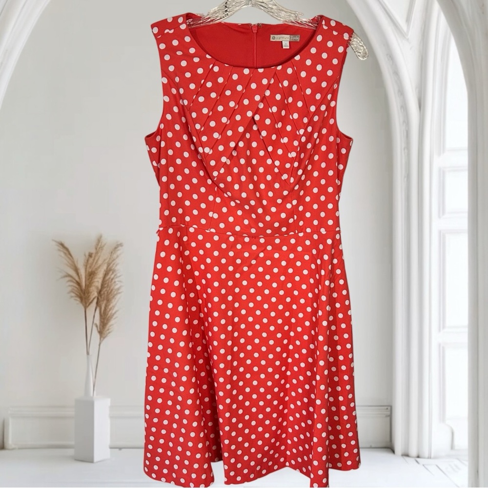 Signature Darby polka dot fit and flare sleeveless dress in a coral melon color